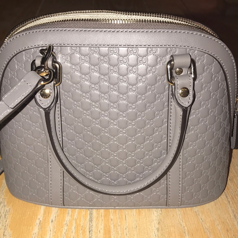 GUCCI authentic Microguccissima Mini Dome Bag